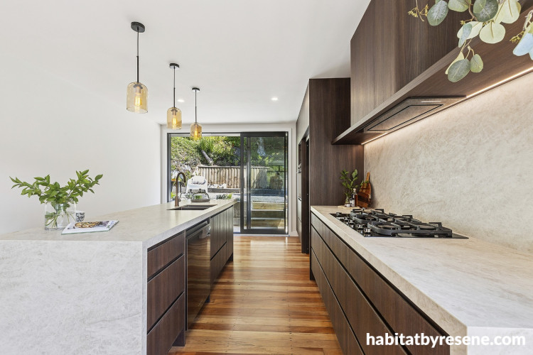 Kitchen featuring neutral walls and ceiling and timber floor