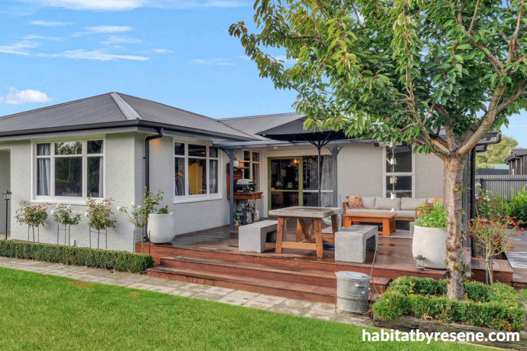 House exterior featuring Resene Pavilion Grey with roof in Ironsand