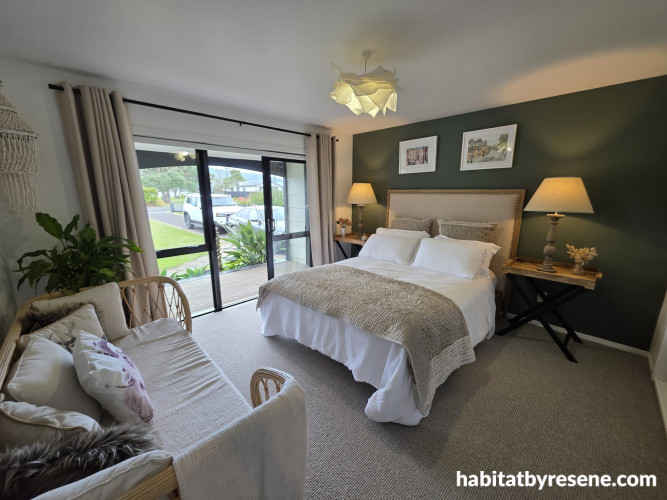 Bedroom with featuring wall in Resene Rivergum, ceiling in White