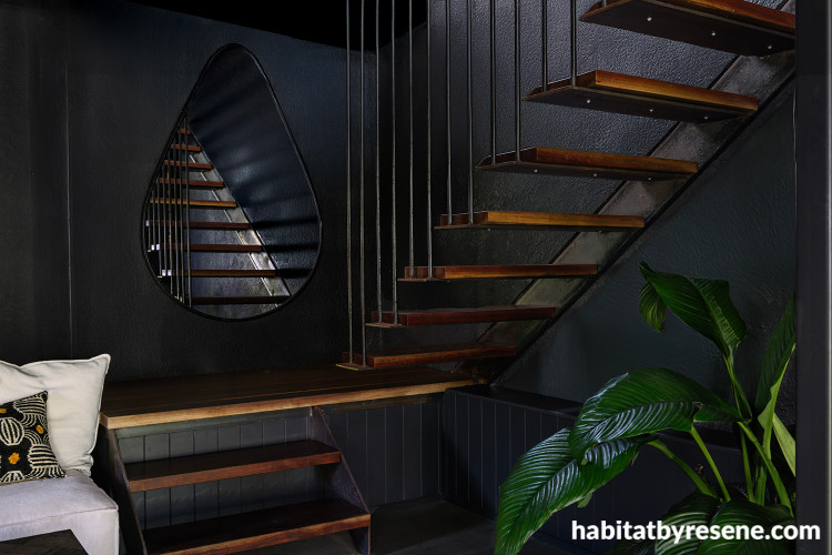 Staircase walls painted in black Resene Element