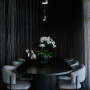 Dining room painted in black Resene Element