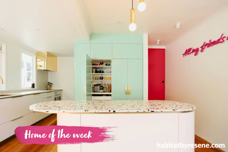 Mint green and white kitchen