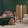 Bedroom featuring dusty pink and deep green