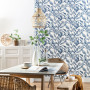 Dining room featuring nature-inspired blue wallpaper