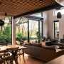 Open plan dining and living area featuring Resene Black White and Black Magic