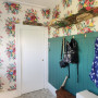 Entryway featuring floral wallpaper