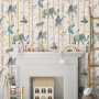 Kids room featuring whimsical wallpaper