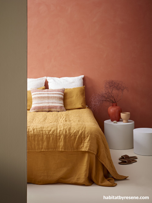 A bedroom painted in Resene orange shades
