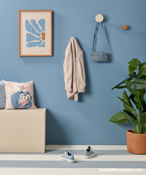 A blue and orange entryway