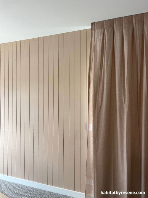 Master bedroom feature wall painted in Resene Shabby Chic with ceiling in Resene Quarter Rice Cake