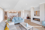 Light beige living area painted in Resene Quarter Sandspit Brown and Resene Alabaster
