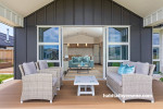 House exterior featuring cladding painted in Resene Lumbersider in Resene Ironsand
