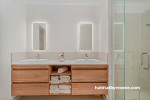 Bathroom painted in Resene Quarter Sandspit Brown and featuring a timber vanity