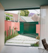 Exterior patio and garden featuring Resene Japonica and Resene Zuccini