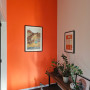 Entranceway, entryway featuring vibrant orange Resene Trinidad