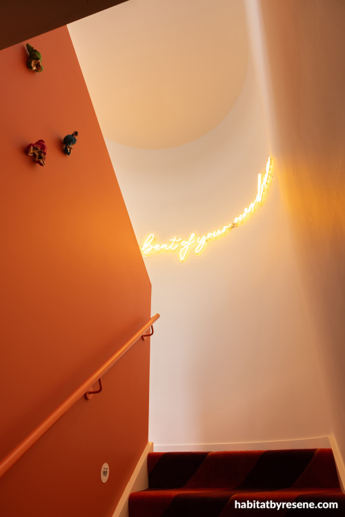 Stairwell painted in Resene Clockwork Orange